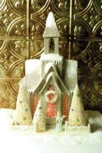 This one even has a golden wreath and a cute little angel. Oh, and it has red light coming from the windows.