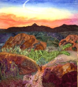 Except possibly a desert sunset. But you have to admire how it almost looks like a painting. But yes, it's a quilt.