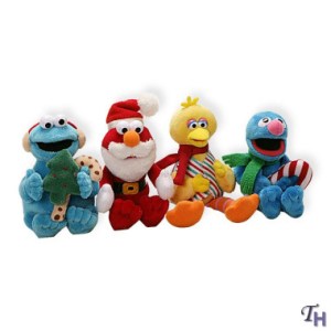 Includes Cookie Monster, Elmo, Big Bird, and Grover. At least Cookie has a chocolate candy cane in this one.