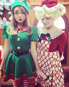 Mrs. Claus seems a bit young in this. Yet, the elf seems to have a rather short skirt.