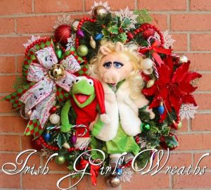 This one has Kermit dressed as Santa and Piggy in a green dress and fur coat. Hope Piggy doesn't have PETA get on her case.