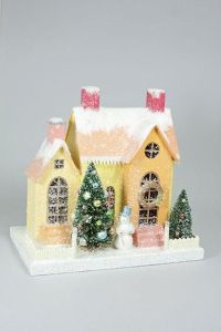 This one has a nice sunny disposition with its orange snow capped roof. Love the tree and snowman in front.