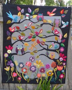 You wouldn't believe the kind of leaves either. Love the blue owl and flowers.