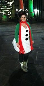 Guess she couldn't really decide. At least she's covered from head to toe for the most part.