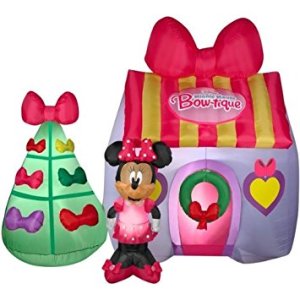 You see, Minnie Mouse is all ready for Christmas. Her Christmas tree is even full of bows like her house.