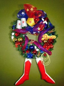 This one has fancy wreath decorations along with Wondy's boots and her lasso. A great wreath for the feminist girl at heart.