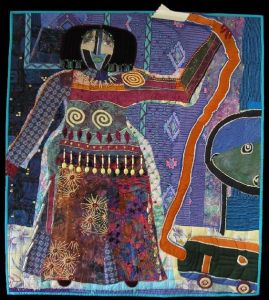 And she seems to be holding a snake. Still, if Picasso did quilting, he'd probably do something like this.