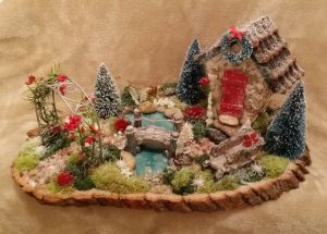 This one uses a Christmas wreath and other holiday touches. So simple yet so quaint.