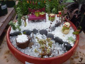 This one has a snowman as well as a bench with gifts. all in all, it's adorable.