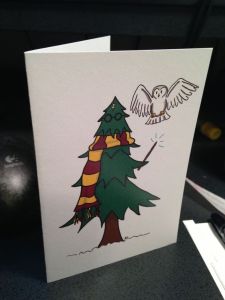 This one has Harry as a tree with his glasses, wand, and Gryffindor scarf. And Hedwig is by his side.