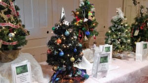 This one has a topper of Starfleet insigina. And I guess its ornaments are the planets they visit.