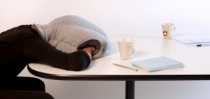 It's the kind of pillow that allows you to nap on your desk while on the job. Might be the kind of gift that says, "I hear you don't get enough sleep and are under a lot of stress."