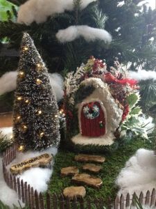 Well, the house is certainly in the Christmas spirit. Love the lighted tree.