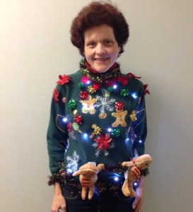 Not sure about having the plush gingerbread men hanging. But they enhance the sweater's ridiculousness.