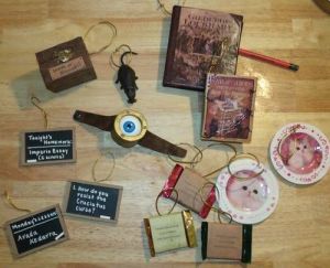 These seem to consist of cat plates, board questions, Moody's magic eye, chocolate bars, Lockhart's books, a boggart box, and Scabbers. You can guess which things belong to which one.