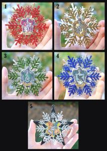 Each one is the color of a Hogwarts House. Hogwarts snowflake is the exception since it represents the whole school.