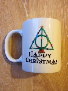 It has the Deathly Hallows symbol as a Christmas tree. That has to be bloody brilliant as Ron would say.