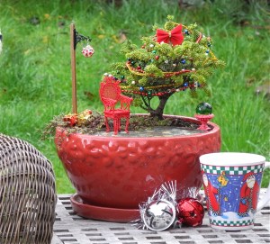 This bonsai tree even has a bow and beads around it. And it goes nicely with the red chair.