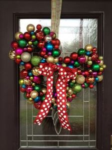 This one has baubles of all kinds of colors. Any Mickey fan would want this on their front door during the holidays.