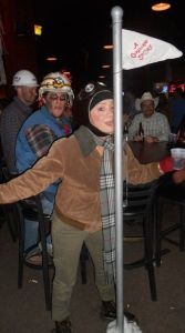 This woman is dressed up as Flick from A Christmas Story. You know the kid who stuck his tongue on the flag pole.