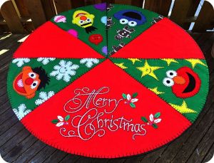 This features Ernie, Bert, Cookie Monster, and Elmo. And it has a red and green pattern.