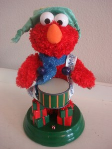 He even has presents below him. Hope he doesn't open his mouth when he plays.