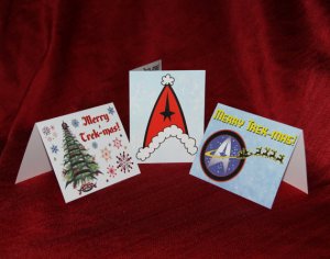 Consists of a Klingnon Christmas tree, Santa hat Starfleet insignia, and a Starlfeet insignia pulled by reindeer. A very Trekkie way to wish your loved ones well.