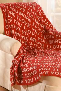 From Refinery29: "Finally, a festive throw full of stalker-y sentiments to curl up under while your bunny boils gently on the stove top." Available at Sky Mall for $69.95.