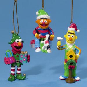 Well, Elmo is dressed as an elf. Ernie makes a rocking horse. Yet, Bert builds a birdhouse, most likely for his pigeons.