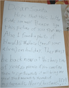 I don't think Santa gives out autographed photos, kid. And I'm sure elves might not be allowed to send their photos out to children either.