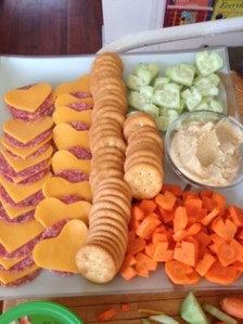 Includes, Ritz crackers, carrots, cucumbers, cheese, and salami. Because baloney is not appropriate for it's a lunchmeat attached to a name that also means bullshit.