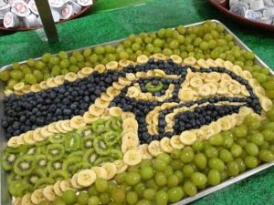 Consists of white grapes, banana, kiwi, and blueberries. Because they have to go by team colors, people.