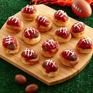 These consists of ground meat on top of a bun covered in cheese and ketchup. Hope you can stomach that.