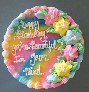 Now that doesn't sound very nice. Sure we're self-deluded in our looks to some extent. But that doesn't mean we should put it on a birthday cake.