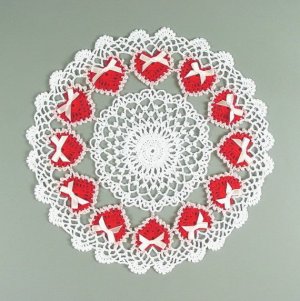 Each red heart is surrounded with lace and has a pink bow. All in all, so beautiful.
