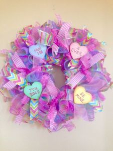 Each heart has a sweet saying among a pastel wreath. So lovely.