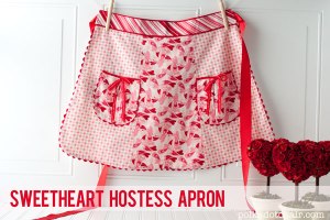 It has hearts all over it along with cute little pockets. Great for any V-Day party.