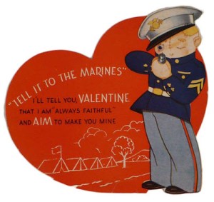 And here he's preparing to shoot off his gun. Doesn't help that the sentiment includes "aim to make you mine." Mine what? Shooting target?