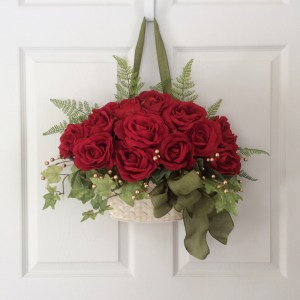 This is called a rose wreath. But it's not a rose wreath. It's roses in a basket. Know the difference.