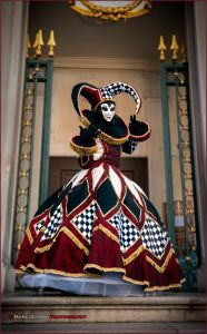 Yes, she may look like a 16th century Harley Quinn. But jesters are common in Venetian Carnival celebrations.