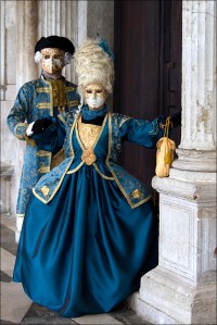 Though they both wear wigs for good measure. The woman's coiffe is especially high.