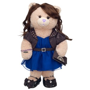 Here she is in her blue dress and shiny shoes. And yes, she has long brown hair, too.