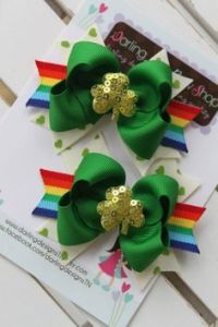 Consists of green bows with sequin gold shamrocks and rainbows. What more can an Irish girl want?