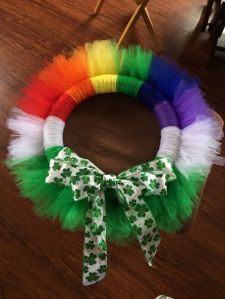 Has all the colors as well as white for cloud and some extra green. And it's all tied in a shamrock bow.