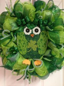 This one even has green bows on its ears. But it doesn't look too happy. Adorable.