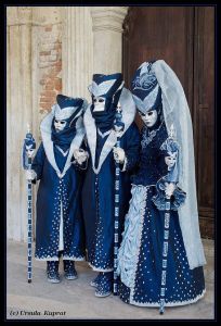 The woman's costume is especially stunning. The boy's outfit is very similar to his dads like he's a miniature version of his old man.