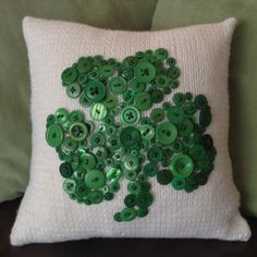 The shamrock here is made of buttons of all sizes. Love it.