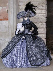 Now that's very classy. Makes me think of a painting. Love the cross on her skirt.