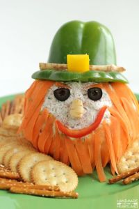 I don't know about you. But this leprechaun looks kind of mean to me. Though nice how they used carrot shavings for a beard and a green pepper hat.