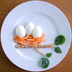 Well, this is quite original for a meal. However, the nest looks quite cheesy.